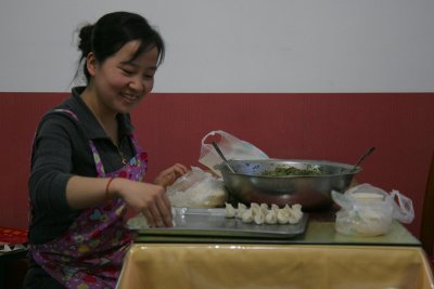 Girl making dumplings
