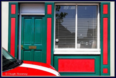 110140 - Ireland - Co.Cork - Kinsale - Red and white car in front of colourful facade  - June 2011.jpg