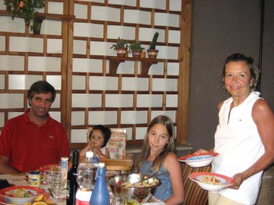 Alessandro, Federica, Alessandra a table & Toti serves.JPG