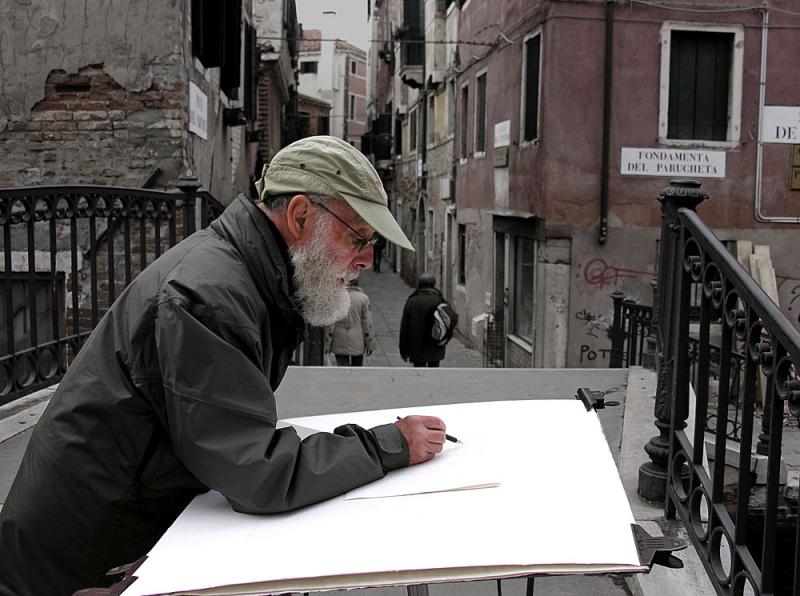 A painter (seen) and an unseen photographer