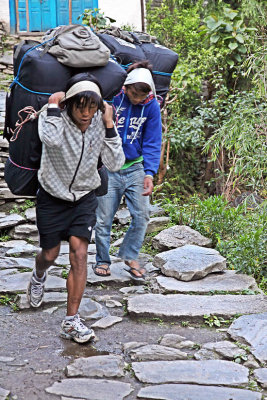 A Nepalese Sherpa and his pack