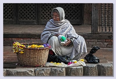 Flowers to sell... and you will help her for a better life