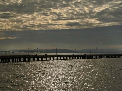 Dramatic Bay Bridge and City