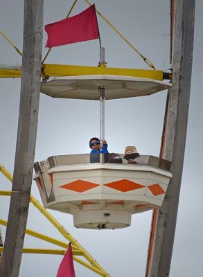 Boy In Giant Ferris Wheel