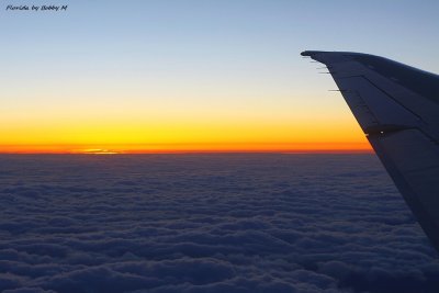 Sunset  above clouds