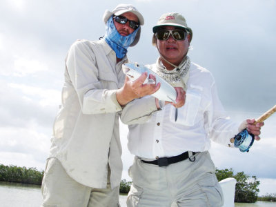 Guide Robin and Angler with Elvis Sunglasses...so funny  3122.jpg