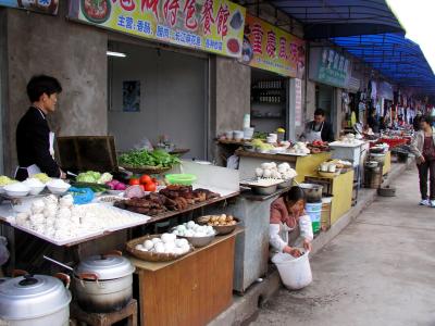 vendors on the road to the Ghost City