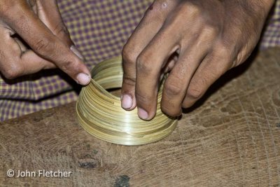 Coiling Bamboo Strips to Make a Cup (Closeup)