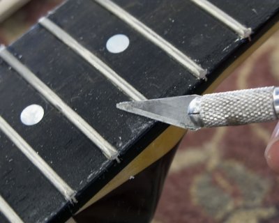 Day 13 - Cleaning The Fret Board