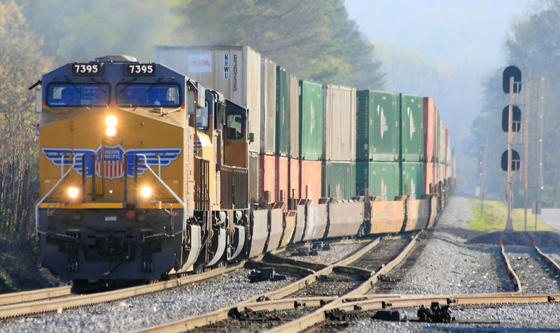 A NS stack train with UP power leaves Irondale off the old passenger main 