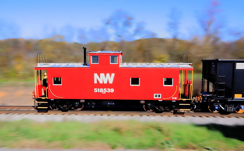 A freshly painted N&W cabb Northbound near Ellis Run 