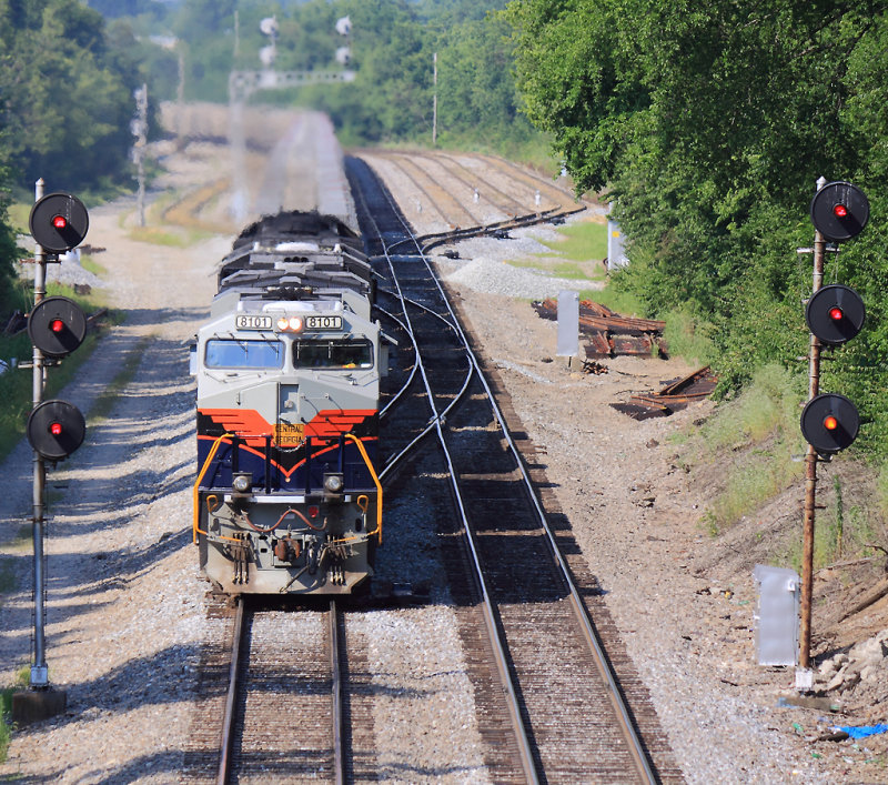 NS 50A eases past the South end of the Danville yard, framed by a unique pair of Triple head GRS signals 