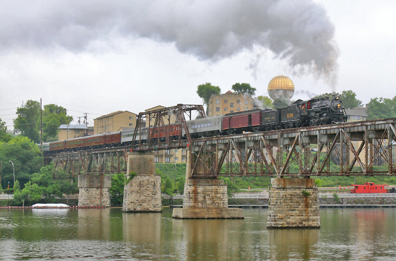 A few rays of sun break through the fog as 630 crosses the river in Knoxville 