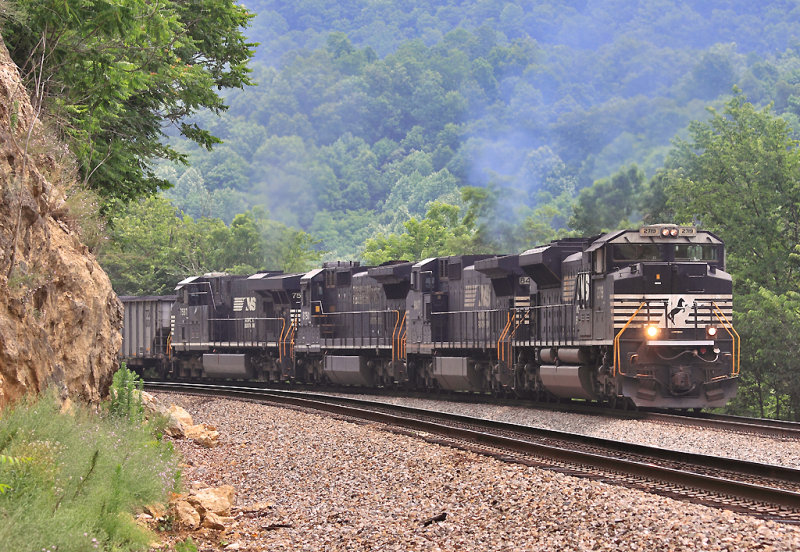 A rare set of pushers (for this district) shoves on the bottom of Eastbound coal loads near Arthur VA 