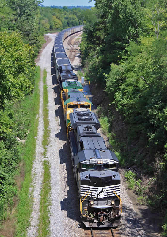 NS 76J (with the Reading heritage unit 2nd out) pulls high past the lower KU yard, before they shoved the loads into the plant. 