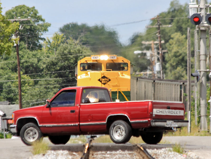 Chevy vs EMD and 12,000 tons of coal , 1067 almost got some red paint on it.