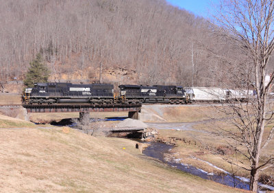 A local passes through a golf course on the Tug Fork Branch 