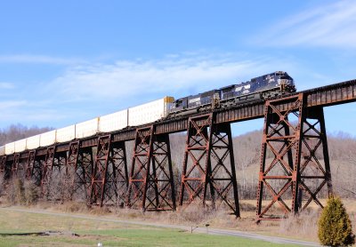 Southbound 223 crosses the Green River bridge under a awesome spring sky 