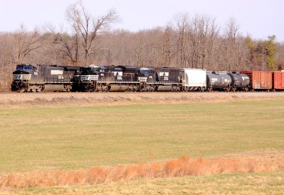 NS 167 sits on #2 track wiating for a rested crew,  while 179 passes by headed South 