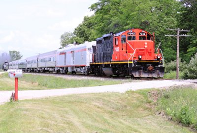 CIRR 7042, a former CN geep, leads the train back to North  Judson