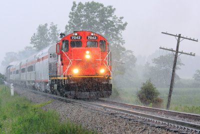 CIRR 7042 leads the train back to North Judson during a summer storm