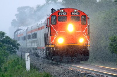 CIRR 7042 leads the train back to North Judson during a summer storm