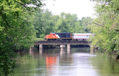 CIRR 7042 trails 765's train across the Kankakee river