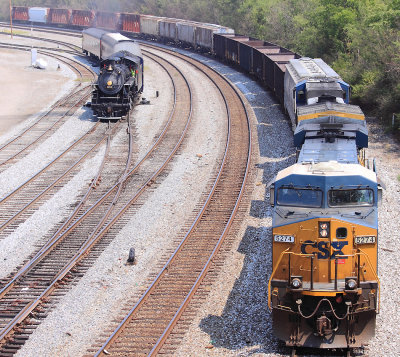 A CSX freight passes the NS CEO's train at CP East End
