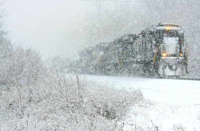 Northbound 144 slogs across single track in a Southern Kentucky snowstorm 