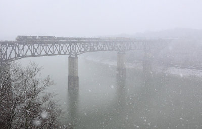 A Northbound rolls across the Cumberland River bridge in a mix of snow and fog. Not much was moving besides the trains this day.