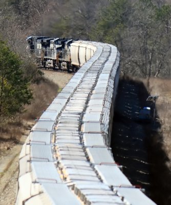 A unit grain train snakes through the long S-Curve south of Cumberland Falls 