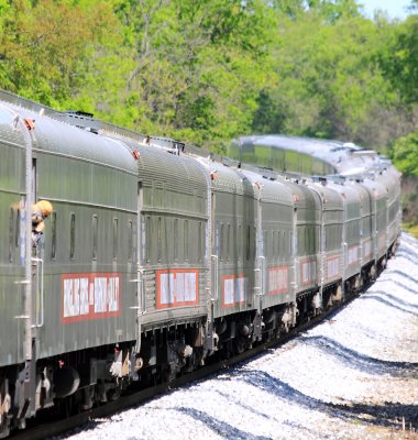 The mile long assortment of coaches and flats eases through the hills of Mercer County 