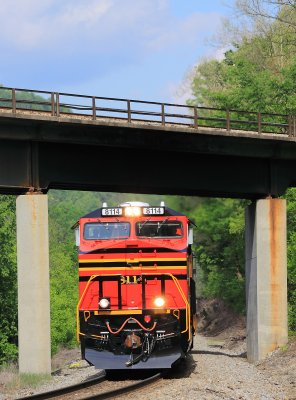 NS Heritage 8114 eases train 387 under the Clinchfield bridge, as they start down the steep grade at Speers Ferry 