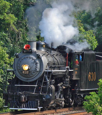 Southern 630 charges out of Roanoke, the first steam on the N&W since 1994