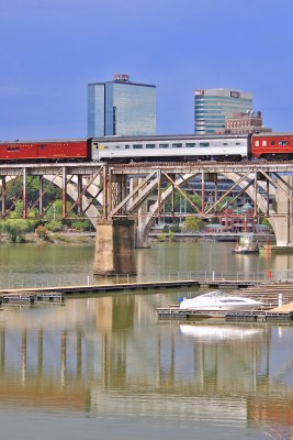 Southern coach 829, owned by the Southern Appalachia Railroad Museum, crosses the TN river at Knoxville 