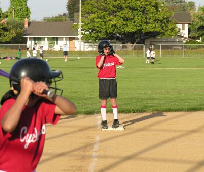 Lauren on 3rd, adjusts her helmet