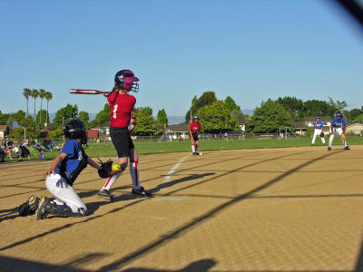 Fred at bat, Katie waits at 3rd