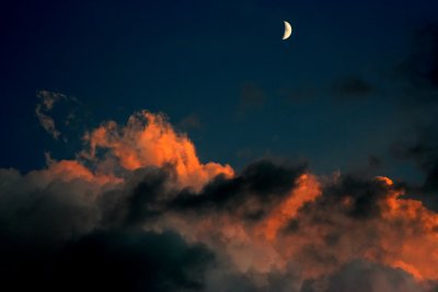 Moon and sunset clouds