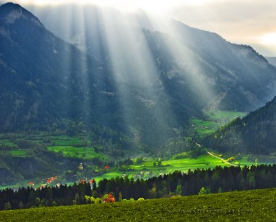 Early morning sun rays in lovely Switzerland