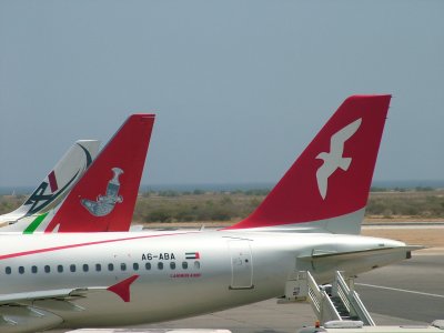 1013 9th June 06 ABA alongside Oman Air in Muscat.JPG