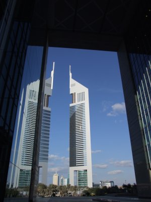 Emirates Towers Mirror Reflection DIFC Dubai.JPG