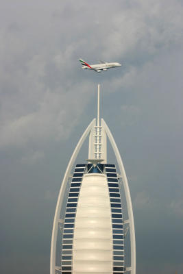 Airbus A380 flying past Burj Al Arab