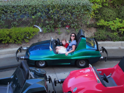 Liam showing Mommy how to drive a race car.