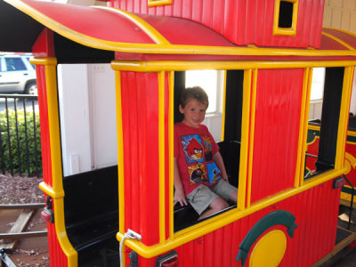 Liam riding the train at Broadway on the Beach