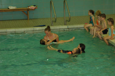 Reagan floating on her back