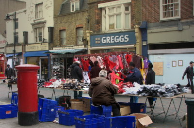 Shoe seller and colour splash.Deptford market.jpg