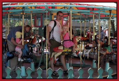 Dad and Emily on the Carousel