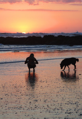 Beachgoer and Wet Dog, Playa Santa Teresa