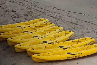 Kayaks On The Beach.