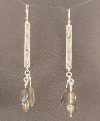 These earrings measure about 3.5cm in length. The sterling bar is patterned, and the labradorite beads flash blue in the light.